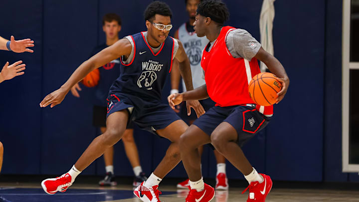 Arizona's Bryce James playing defense in practice