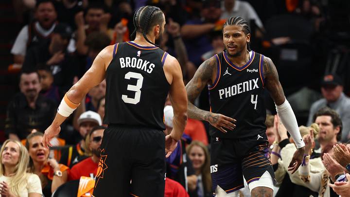 Apr 27, 2026; Phoenix, Arizona, USA; Phoenix Suns forward Dillon Brooks (3) celebrates with guard Jalen Green (4) against the Oklahoma City Thunder during game four of the first round of the 2026 NBA Playoffs at Mortgage Matchup Center. Mandatory Credit: Mark J. Rebilas-Imagn Images
