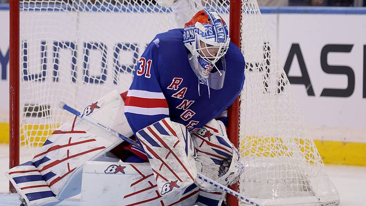 Oct 1, 2026; New York, New York, USA; New York Rangers goaltender Igor Shesterkin (31) plays the puck against the Tampa Bay Lightning during the second period at Madison Square Garden. Mandatory Credit: Brad Penner-Imagn Images