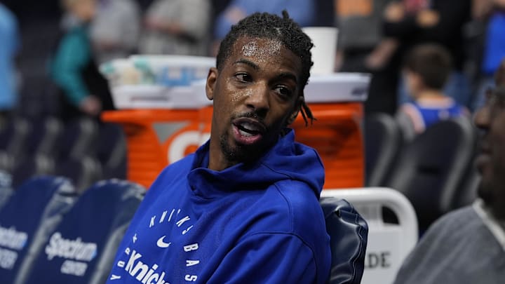 Mar 20, 2025; Charlotte, North Carolina, USA; New York Knicks guard Delon Wright (0) during pregame warmups against the Charlotte Hornets at Spectrum Center. Mandatory Credit: Jim Dedmon-Imagn Images