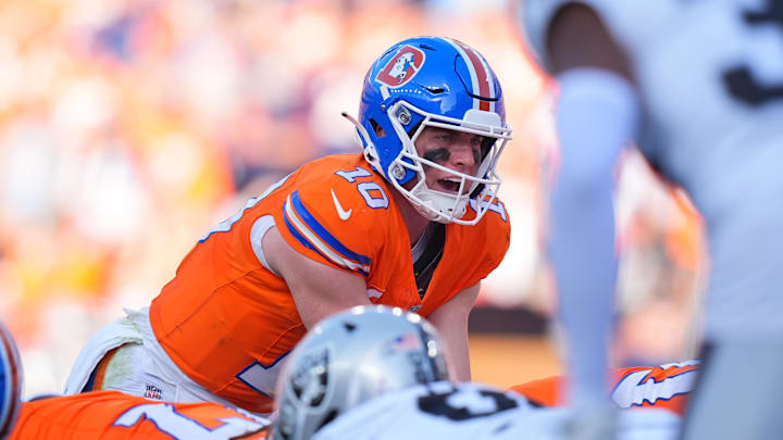 Bo Nix lines up under center during the Broncos - Raiders game in Week 5.