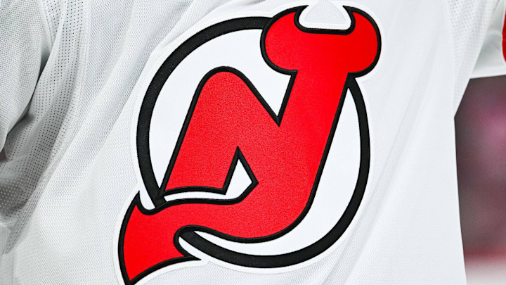 Feb 8, 2025; Montreal, Quebec, CAN; View of a New Jersey Devils logo on a jersey worn by a member of the team during the second period at Bell Centre. Mandatory Credit: David Kirouac-Imagn Images