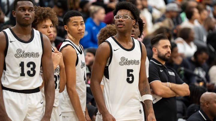 Sierra Canyon’s Bryce James (5), the son of NBA player LeBron James, stands with his teammates by the bench before the game between Sierra Canyon and Bartlett High School.