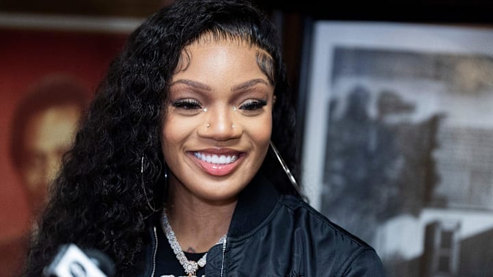 Rapper GloRilla smiles during a press conference to present a check for $25,000 to Melrose High School, where she graduated from in 2017, in the school’s library in Memphis, Tenn., on Wednesday, December 18, 2024. Rapper GloRilla smiles during a press conference to present a check for $25,000 to Melrose High School, where she graduated from in 2017, in the school’s library in Memphis, Tenn., on Wednesday, December 18, 2024.