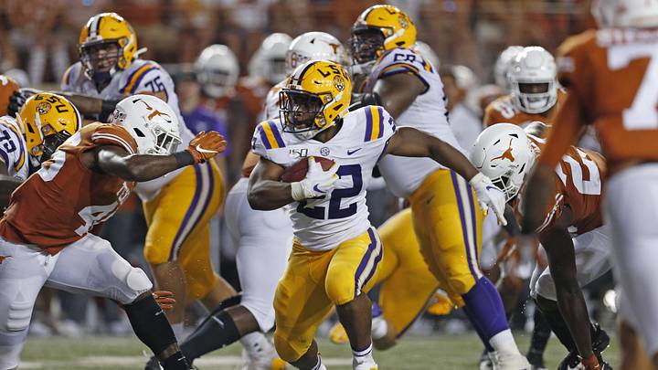 LSU Tigers running back Clyde Edwards-Helaire (22) looks for running room against the Texas Longhorns in the first half at Darrell K Royal-Texas Memorial Stadium. LSU Tigers running back Clyde Edwards-Helaire (22) looks for running room against the Texas Longhorns in the first half at Darrell K Royal-Texas Memorial Stadium.