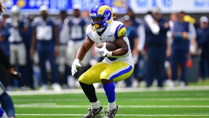 Aug 11, 2024; Inglewood, California, USA; Los Angeles Rams running back Boston Scott (30) runs the ball during the first half at SoFi Stadium. Mandatory Credit: Gary A. Vasquez-USA TODAY Sports