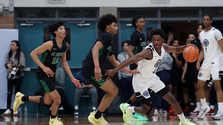 Jan 3, 2025; Gilbert, AZ, USA; CIA Bella Vista (AZ) guard Aginaldo Neto (4) against Arizona Compass Prep guard Kalek House (5) and brother Kaden House (10) during the Hoophall West High School Invitational at Highland High School. Mandatory Credit: Mark J. Rebilas-Imagn Images