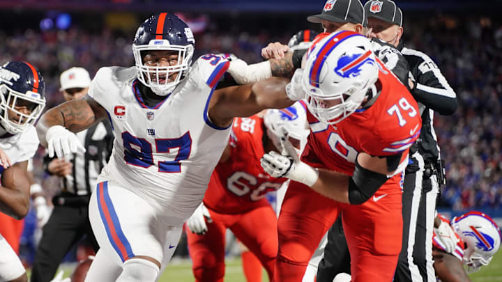 Oct 15, 2023; Orchard Park, New York, USA; New York Giants defensive tackle Dexter Lawrence II (97) and Buffalo Bills offensive tackle Spencer Brown (79) shove one another after a play during the second half at Highmark Stadium. Oct 15, 2023; Orchard Park, New York, USA; New York Giants defensive tackle Dexter Lawrence II (97) and Buffalo Bills offensive tackle Spencer Brown (79) shove one another after a play during the second half at Highmark Stadium.