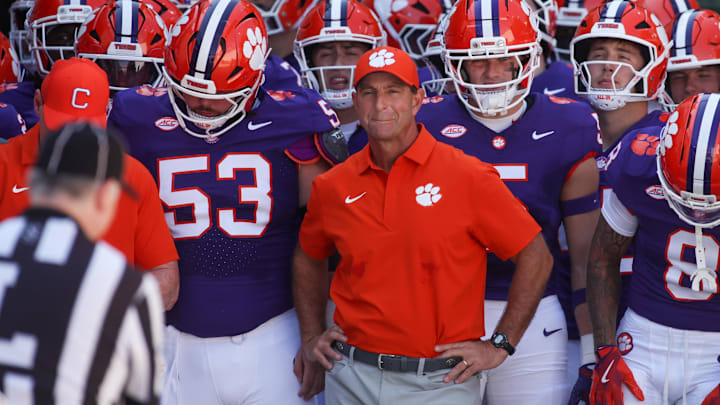 Clemson Tigers head coach Dabo Swinney prepares to run on the field with his team before a game against Georgia Tech.