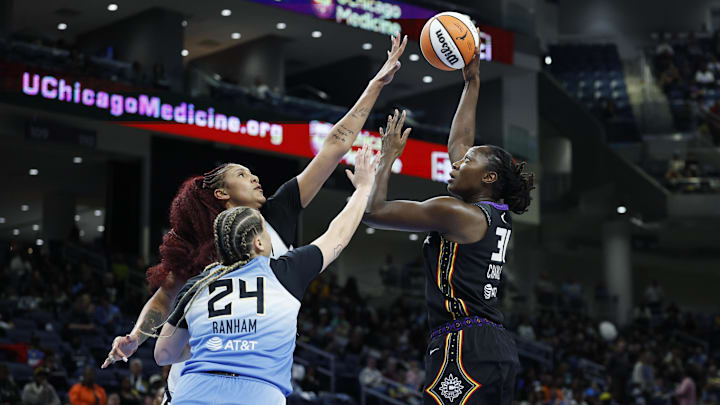 Sep 3, 2025; Chicago, Illinois, USA; Connecticut Sun center Tina Charles (31) shoots against the Chicago Sky during the first half at Wintrust Arena. Mandatory Credit: Kamil Krzaczynski-Imagn Images