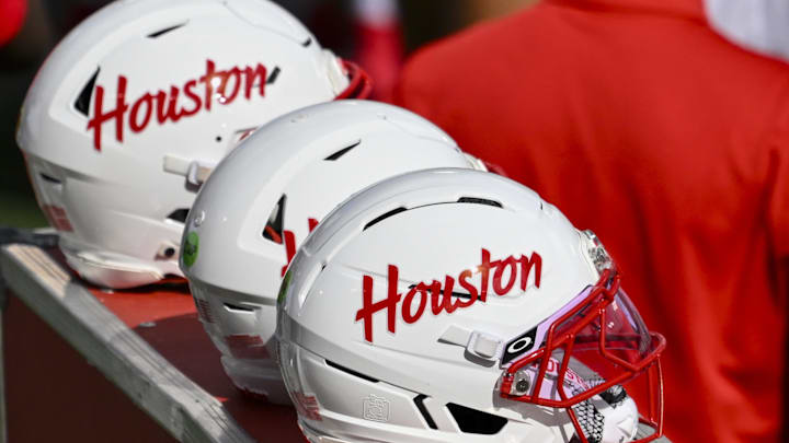 Oct 18, 2025; Houston, Texas, USA; A detail view of Houston Cougars helmets on the sideline during the game against the Arizona Wildcats at TDECU Stadium. Mandatory Credit: Maria Lysaker-Imagn Images 