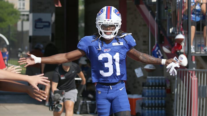 Bills rookie defensive back Maxwell Hairston high-fives fans as he runs onto the field during day five of Buffalo Bills training camp at St. John Fisher University Monday, July 28, 2025 in Pittsford, NY.