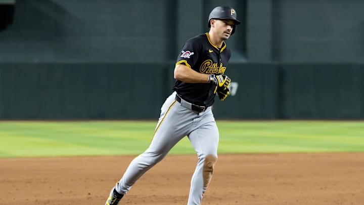 May 27, 2025; Phoenix, Arizona, USA; Pittsburgh Pirates shortstop Bryan Reynolds rounds the bases after hitting a three run home run in the eighth inning against the Arizona Diamondbacks at Chase Field. Mandatory Credit: Mark J. Rebilas-Imagn Images