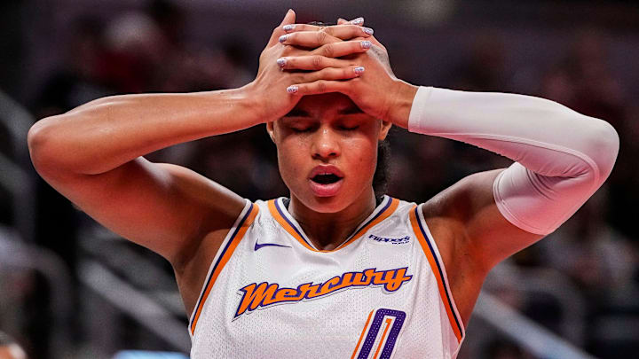 Phoenix Mercury forward Satou Sabally (0) holds her head Wednesday, July 30, 2025, during the game at Gainbridge Fieldhouse in Indianapolis. The Indiana Fever defeated the Phoenix Mercury, 107-101.