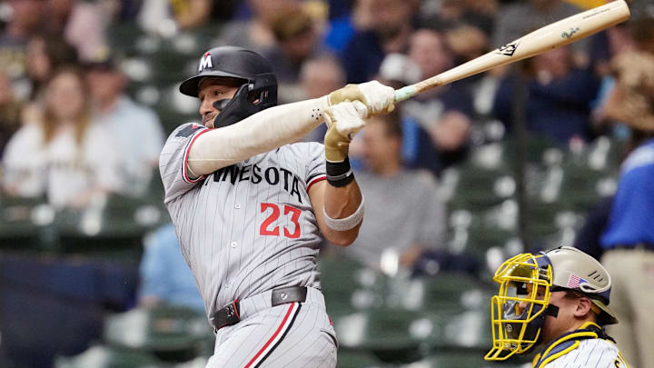 May 16, 2025; Milwaukee, Wisconsin, USA;  Minnesota Twins third baseman Royce Lewis (23) singles during the fourth inning against the Milwaukee Brewers at American Family Field.