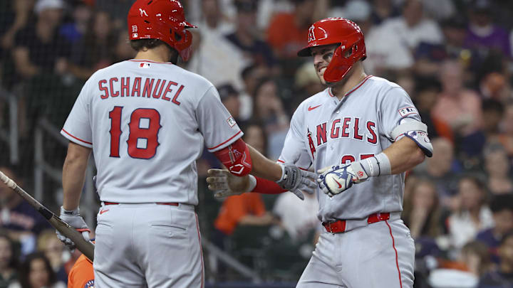 Mar 27, 2026; Houston, Texas, USA; Los Angeles Angels center fielder Mike Trout (27) celebrates with first baseman Nolan Schanuel (18) after hitting a home run during the fifth inning against the Houston Astros at Daikin Park. Mandatory Credit: Troy Taormina-Imagn Images Mar 27, 2026; Houston, Texas, USA; Los Angeles Angels center fielder Mike Trout (27) celebrates with first baseman Nolan Schanuel (18) after hitting a home run during the fifth inning against the Houston Astros at Daikin Park. Mandatory Credit: Troy Taormina-Imagn Images