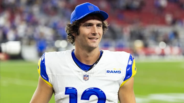 Dec 7, 2025; Glendale, Arizona, USA; Los Angeles Rams quarterback Stetson Bennett IV (13) against the Arizona Cardinals at State Farm Stadium. Mandatory Credit: Mark J. Rebilas-Imagn Images