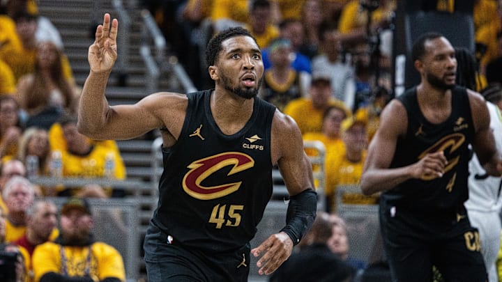 May 9, 2025; Indianapolis, Indiana, USA; Cleveland Cavaliers guard Donovan Mitchell (45) celebrates a made basket during game three of the second round for the 2025 NBA Playoffs against the Indiana Pacers at Gainbridge Fieldhouse. Mandatory Credit: Trevor Ruszkowski-Imagn Images