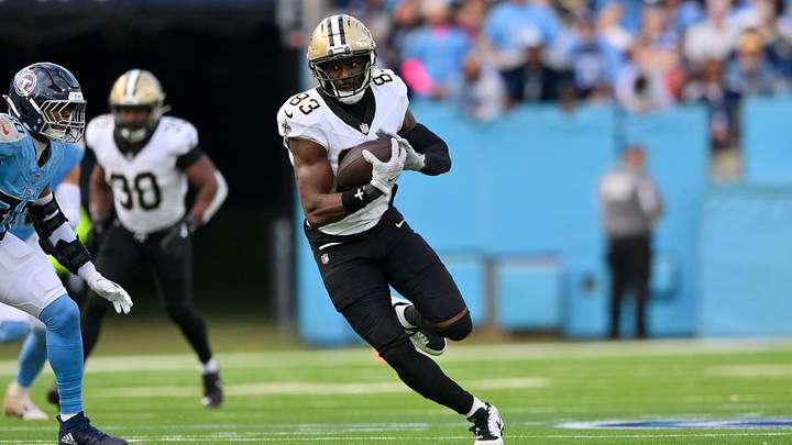 New Orleans Saints tight end Juwan Johnson (83) runs with the ball after a made catch against the Tennessee Titans during the second half at Nissan Stadium. New Orleans Saints tight end Juwan Johnson (83) runs with the ball after a made catch against the Tennessee Titans during the second half at Nissan Stadium.