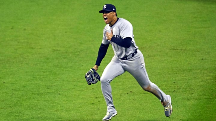 Oct 19, 2024; Cleveland, Ohio, USA; New York Yankees outfielder Juan Soto (22) makes the final out during the tenth inning to beat the Cleveland Guardians during game five of the ALCS for the 2024 MLB playoffs at Progressive Field. Mandatory Credit: David Richard-Imagn Images