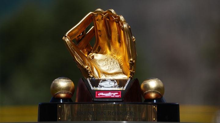 Apr 9, 2023; Denver, Colorado, USA; Detailed view of the Gold Glove award for Colorado Rockies infielder Brendan Rodgers (7) (not pictured before the game Washington Nationals at Coors Field. Mandatory Credit: Ron Chenoy-Imagn Images