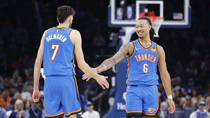 Mar 19, 2025; Oklahoma City, Oklahoma, USA; Oklahoma City Thunder forward Jaylin Williams (6) and Oklahoma City Thunder forward Chet Holmgren (7) high five after a play against the Philadelphia 76ers during the second half at Paycom Center. Mandatory Credit: Alonzo Adams-Imagn Images