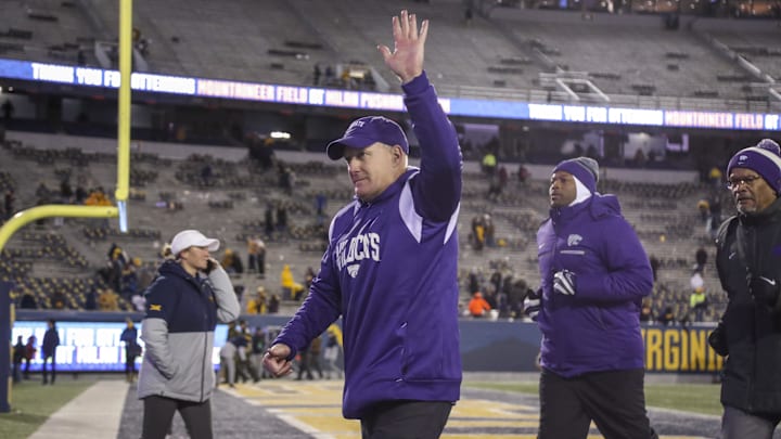 Nov 19, 2022; Morgantown, West Virginia, USA; Kansas State Wildcats head coach Chris Klieman celebrates after defeating the West Virginia Mountaineers at Mountaineer Field at Milan Puskar Stadium. Mandatory Credit: Ben Queen-USA TODAY Sports
