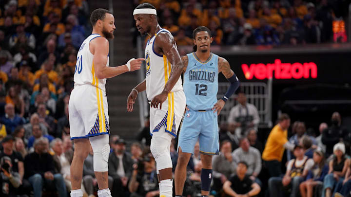 Apr 15, 2025; San Francisco, California, USA; Golden State Warriors guard Stephen Curry (30) talks with forward Jimmy Butler III (10) during a break in the action against the Memphis Grizzlies in the second quarter at the Chase Center. Mandatory Credit: Cary Edmondson-Imagn Images
