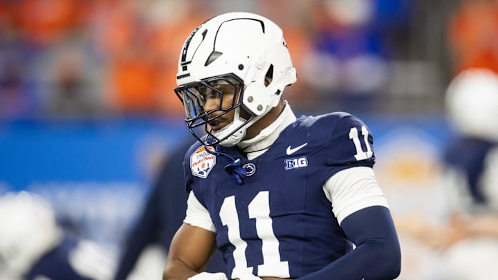 Dec 31, 2024; Glendale, AZ, USA; Penn State Nittany Lions defensive end Abdul Carter (11) against the Boise State Broncos in the Fiesta Bowl at State Farm Stadium. Mandatory Credit: Mark J. Rebilas-Imagn Images