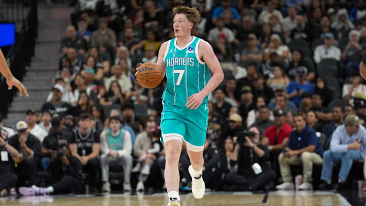 Mar 14, 2026; San Antonio, Texas, USA;  Charlotte Hornets guard Kon Knueppel (7) dribbles up the court in the first half against the San Antonio Spurs at Frost Bank Center. Mandatory Credit: Daniel Dunn-Imagn Images