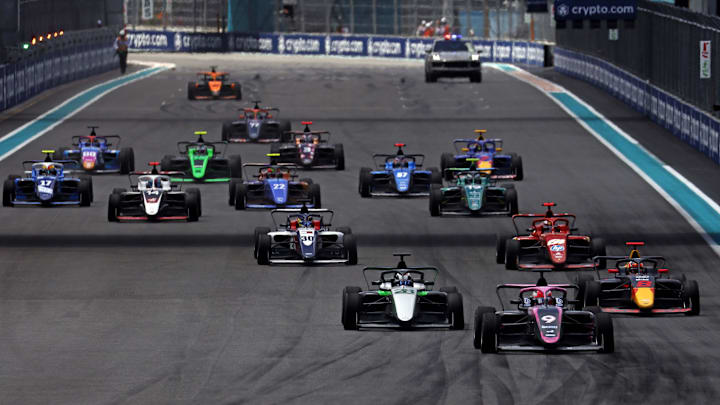 May 4, 2024; Miami Gardens, Florida, USA; F1 Academy driver Abbi Pulling (9) leads the start of the F1 Academy First Race at Miami International Autodrome. Mandatory Credit: Peter Casey-Imagn Images