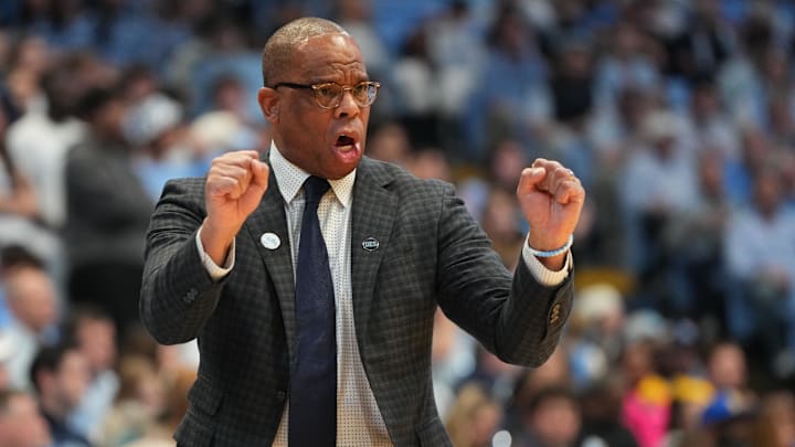 North Carolina head coach Hubert Davis should be on the hot seat, but he likely gets another season because of mitigating circumstances.