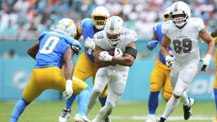 Miami Dolphins tight end Julian Hill (89) runs the ball against the Los Angeles Chargers during the fourth quarter at Hard Rock Stadium. 