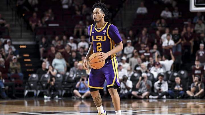 Jan 3, 2026; College Station, Texas, USA;  Louisiana State Tigers guard Jalen Reece (2) controls the ball  during the second half against the Texas A&M Aggies at Reed Arena. Mandatory Credit: Maria Lysaker-Imagn Images 