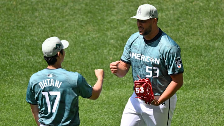 Jul 11, 2023; Seattle, Washington, USA; American League designated hitter/pitcher Shohei Ohtani of the Los Angeles Angels of Anaheim (17) and pitcher Carlos Estevez of the Los Angeles Angels of Anaheim (53) practice before the game at T-Mobile Park. Mandatory Credit: Steven Bisig-Imagn Images Jul 11, 2023; Seattle, Washington, USA; American League designated hitter/pitcher Shohei Ohtani of the Los Angeles Angels of Anaheim (17) and pitcher Carlos Estevez of the Los Angeles Angels of Anaheim (53) practice before the game at T-Mobile Park. Mandatory Credit: Steven Bisig-Imagn Images