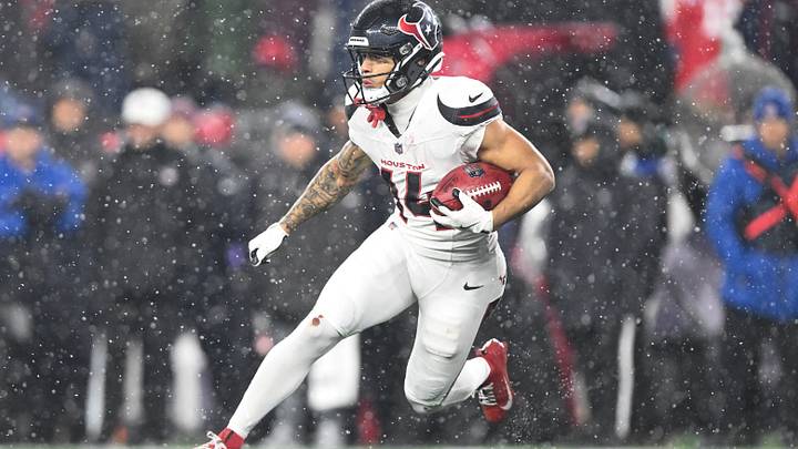 Jan 18, 2026; Foxborough, MA, USA; Houston Texans wide receiver Jaylin Noel (14) runs with the ball in the fourth quarter against the New England Patriots in an AFC Divisional Round game at Gillette Stadium. Mandatory Credit: Brian Fluharty-Imagn Images