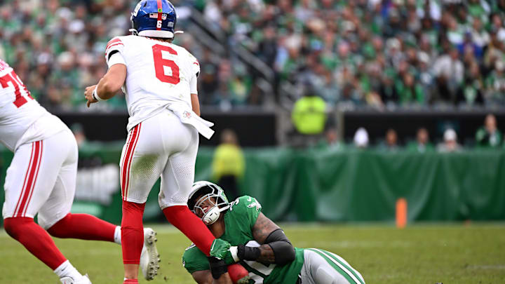Oct 26, 2025; Philadelphia, Pennsylvania, USA; Philadelphia Eagles linebacker Jihaad Campbell (30) tackles New York Giants quarterback Jaxson Dart (6) in the fourth quarter at Lincoln Financial Field. Oct 26, 2025; Philadelphia, Pennsylvania, USA; Philadelphia Eagles linebacker Jihaad Campbell (30) tackles New York Giants quarterback Jaxson Dart (6) in the fourth quarter at Lincoln Financial Field.