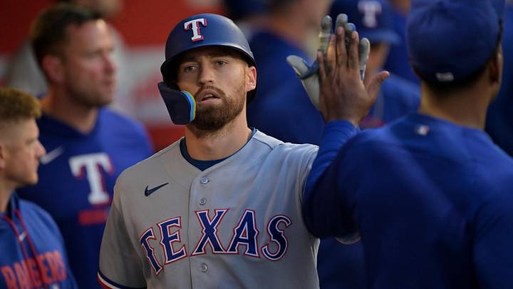May 22, 2026; Anaheim, California, USA; Texas Rangers right fielder Brandon Nimmo (24) is congratulated in the dugout after hitting a solo home run during the fourth inning against the Los Angeles Angels at Angel Stadium. May 22, 2026; Anaheim, California, USA; Texas Rangers right fielder Brandon Nimmo (24) is congratulated in the dugout after hitting a solo home run during the fourth inning against the Los Angeles Angels at Angel Stadium.
