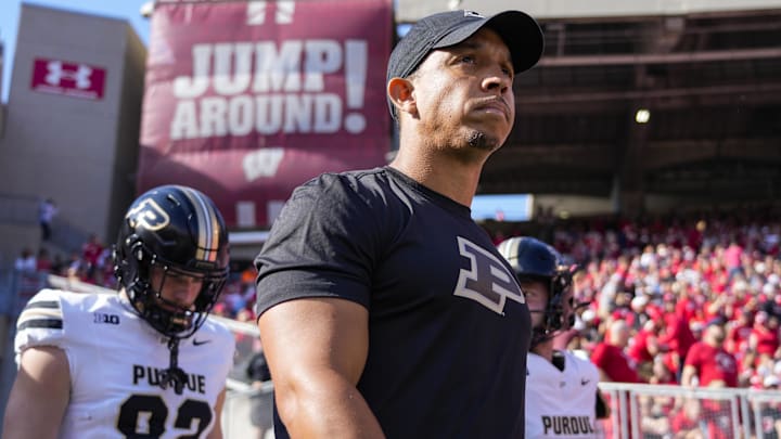 Purdue Boilermakers head coach Ryan Walters walks onto the field