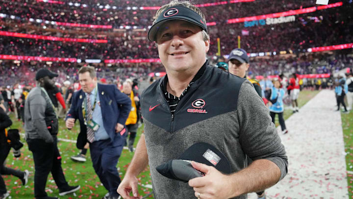 Jan 9, 2023; Inglewood, CA, USA; Georgia Bulldogs head coach Kirby Smart runs off the field after winning the CFP national championship game against the TCU Horned Frogs at SoFi Stadium. Mandatory Credit: Kirby Lee-Imagn Images