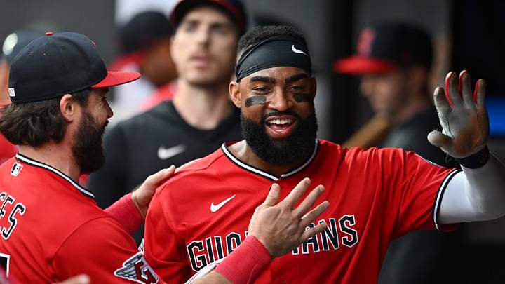 Cleveland, Ohio, USA; Cleveland Guardians right fielder Jo Adell, right, celebrates with catcher Austin Hedges after his sixth RBI of the game against the San Francisco Giants at Progressive Field. Mandatory Credit: Ken Blaze-Imagn Images