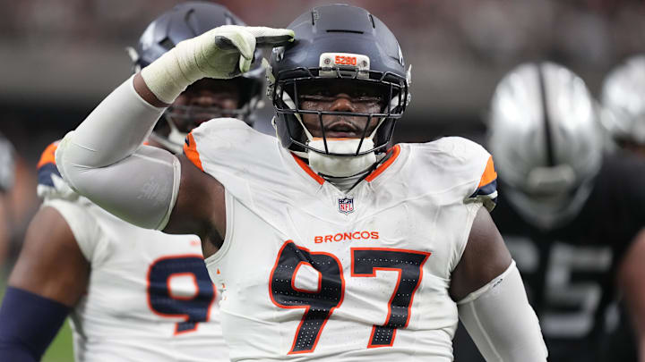 Dec 7, 2025; Paradise, Nevada, USA; Denver Broncos defensive tackle Malcolm Roach (97) reacts after a sack against the Las Vegas Raiders during the first half at Allegiant Stadium. Dec 7, 2025; Paradise, Nevada, USA; Denver Broncos defensive tackle Malcolm Roach (97) reacts after a sack against the Las Vegas Raiders during the first half at Allegiant Stadium.