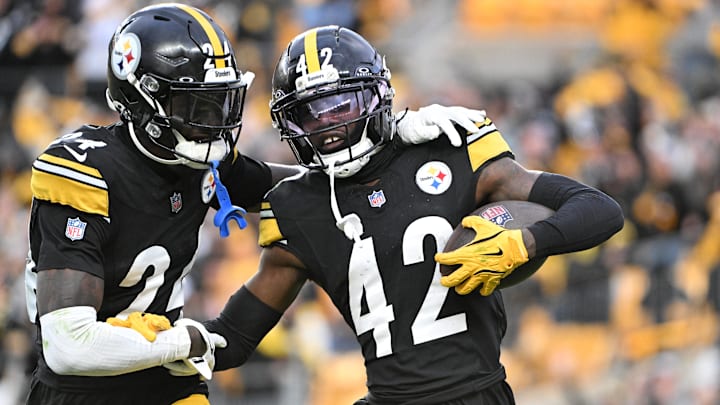 Nov 16, 2025; Pittsburgh, Pennsylvania, USA; Pittsburgh Steelers cornerback James Pierre (42) celebrates with cornerback Joey Porter Jr. (24) after scoring a touchdown against the Cincinnati Bengals during the fourth quarter at Acrisure Stadium. Mandatory Credit: Barry Reeger-Imagn Images