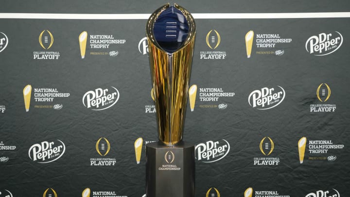 Jan 6, 2024; Houston, TX, USA; A general view of the National Championship Trophy during media day before the College Football Playoff national championship between the Michigan Wolverines and the Washington Huskies at George R Brown Convention Center. Mandatory Credit: Kirby Lee-USA TODAY Sports Jan 6, 2024; Houston, TX, USA; A general view of the National Championship Trophy during media day before the College Football Playoff national championship between the Michigan Wolverines and the Washington Huskies at George R Brown Convention Center. Mandatory Credit: Kirby Lee-USA TODAY Sports