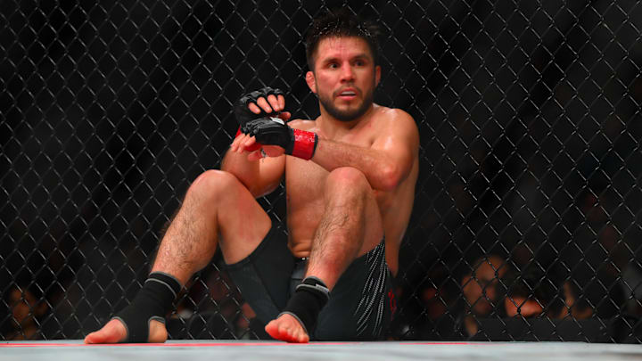 Henry Cejudo sits down after being poked in the eye by Song Yadong during UFC Fight Night in Seattle. Henry Cejudo sits down after being poked in the eye by Song Yadong during UFC Fight Night in Seattle.