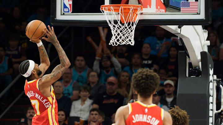 Nov 16, 2025; Phoenix, Arizona, USA; Atlanta Hawks guard Nickeil Alexander-Walker (7) scores during the first half against the Phoenix Suns at Mortgage Matchup Center. Mandatory Credit: Allan Henry-Imagn Images