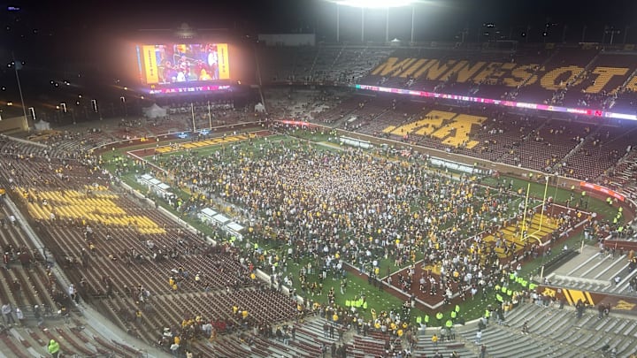 The Gophers home crowd storming the field after Friday's upset win over No. 25 Nebraska.