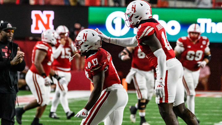 Willis McGahee IV (17) and Princewill Umanmielen celebrate Nebraska’s recovery of a Colorado fumble to secure the win. Willis McGahee IV (17) and Princewill Umanmielen celebrate Nebraska’s recovery of a Colorado fumble to secure the win.