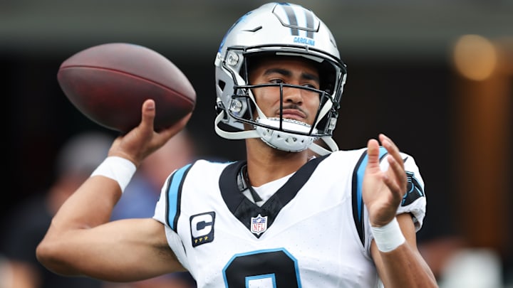 Oct 5, 2025; Charlotte, North Carolina, USA; Carolina Panthers quarterback Bryce Young (9) warms up during the first quarter against the Miami Dolphins at Bank of America Stadium. 