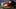 Dark blue Washington Nationals hat on top of a light brown mitt Dark blue Washington Nationals hat on top of a light brown mitt